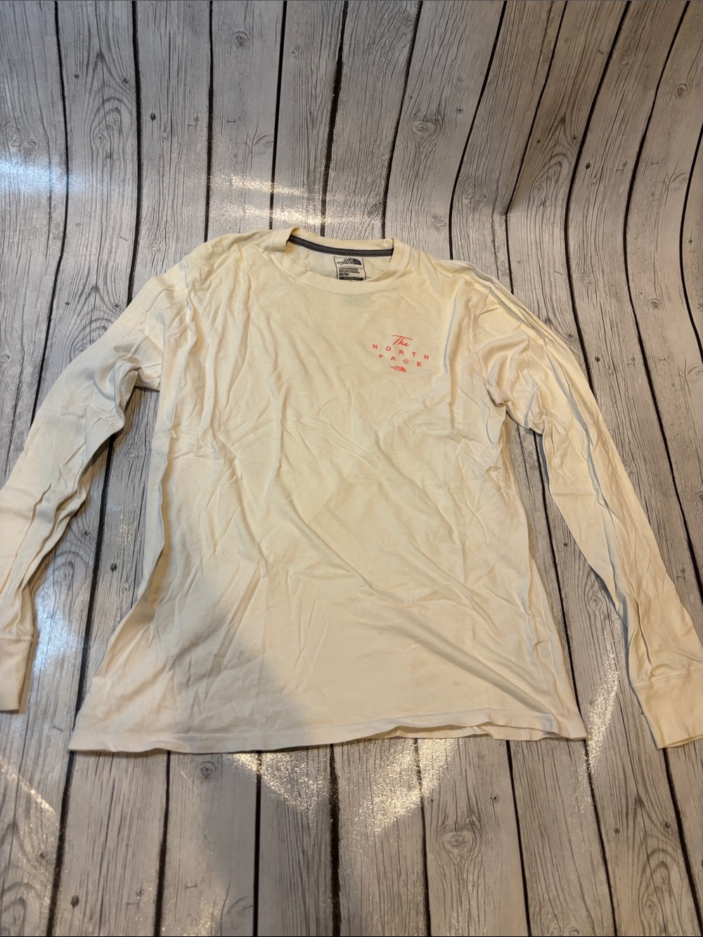The North Face Men's size medium Long-Sleeve Cream Graphic Tee